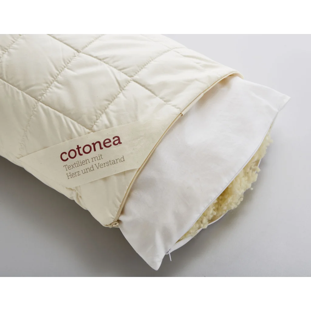 Bio Kopfkissen mit Füllung Schafschurwolle in Creme von Cotonea Größe 40x60 cm