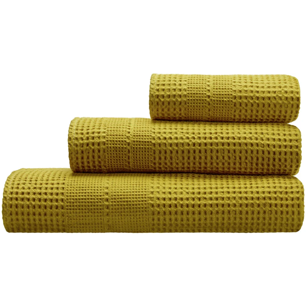 Bio Waffelpiqué Duschtuch in Curry Gelb von Cotonea Größe 70x140 cm